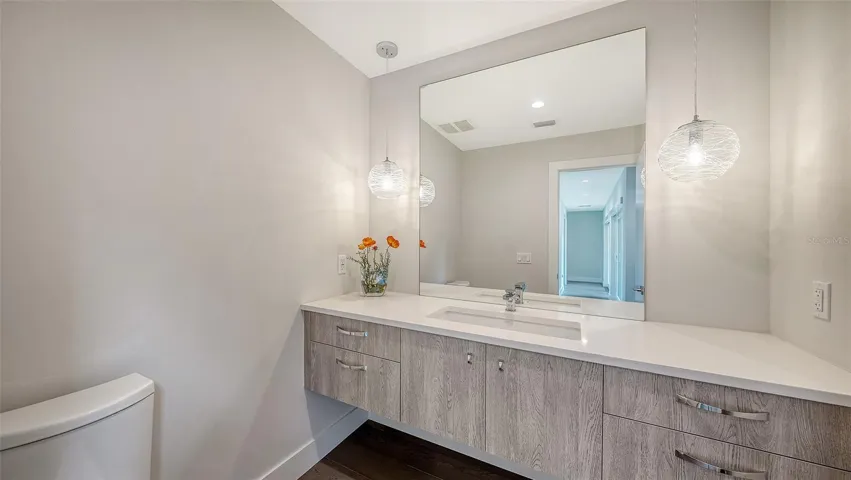 Additional half bath for family and visitors.