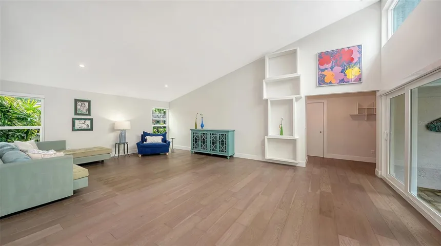 Clerestory windows and soaring ceilings define the great room.
