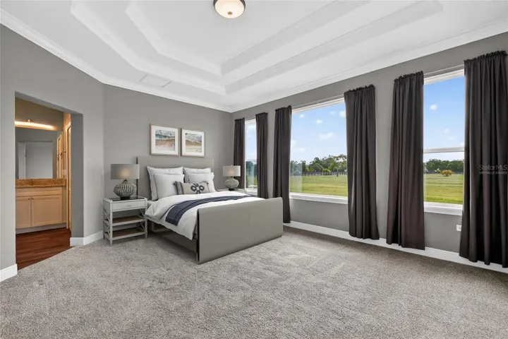Virtually staged primary suite ~