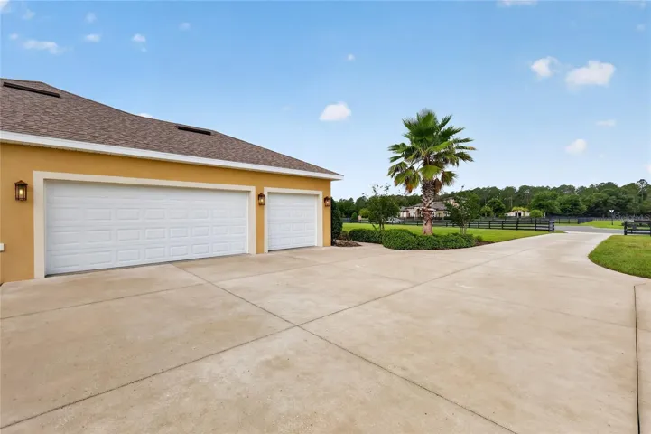 View of attached 3-car garage ~