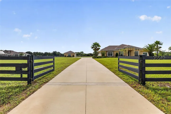 Driveway gate with automatic opener ~