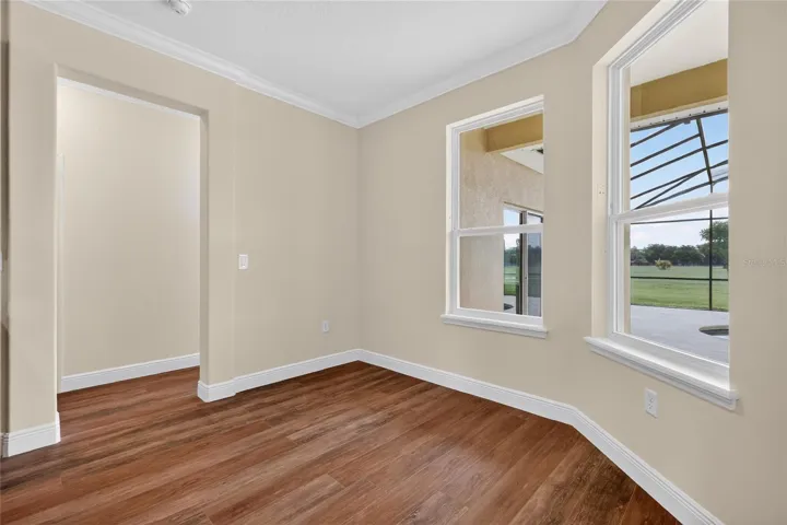 Breakfast nook - hallway to garage, laundry, and primary suite ~