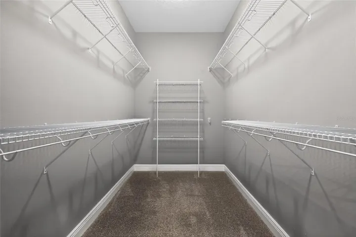 Primary closet 5'x10' ~