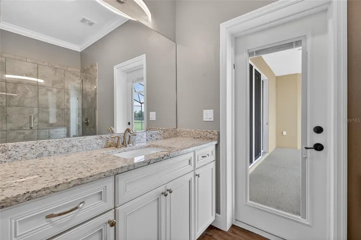 Bath 3 is ensuite to Bedroom 4 and serves as the pool bath ~