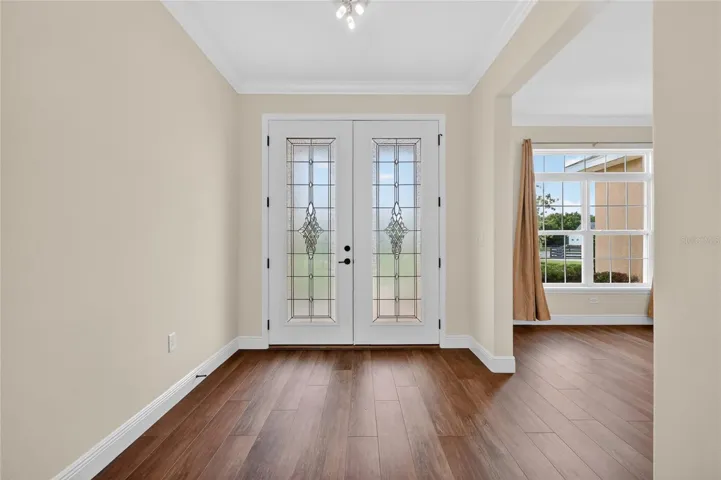 Beautiful leaded glass doors allow filtered light inside ~