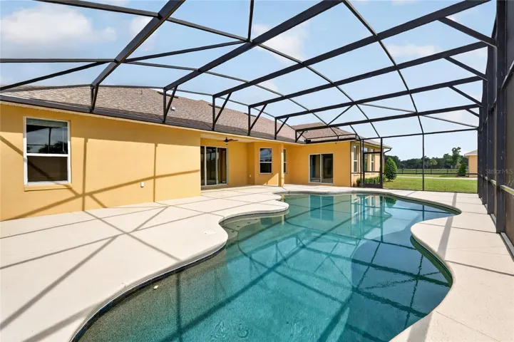 The refreshing pool features a built-in bench ~