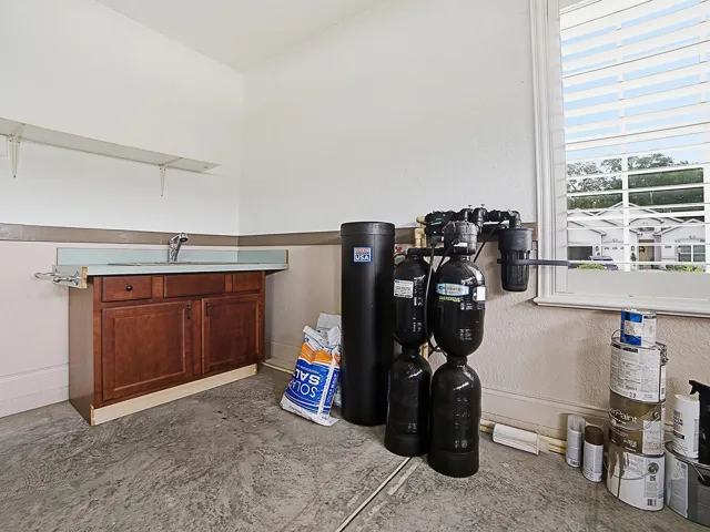 Utility Sink, Water Filter and Softener.