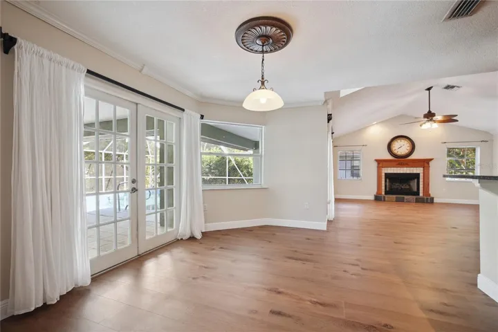 Kitchen dining area leads to outdoor oasis