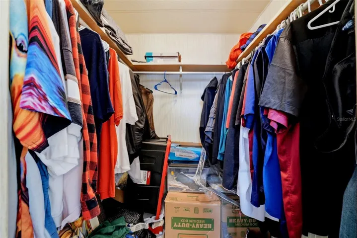 Primary closet is big, just full of sellers stuff as he prepares to move.
