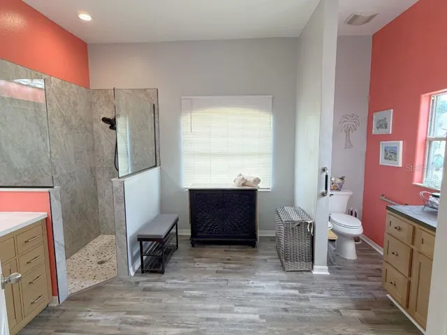 Primary Bathroom with new luxury vinyl flooring