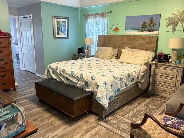 Primary Bedroom with new luxury vinyl flooring