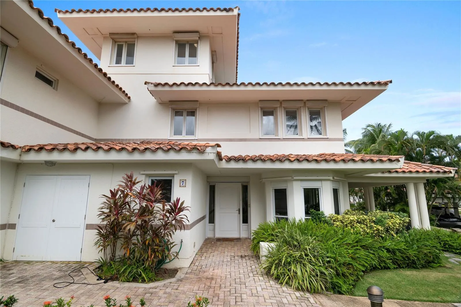 Three Story Residence at The Cottages. Residents benefit from a shared backup generator and a cistern for the community! Includes Carport for 2 spaces