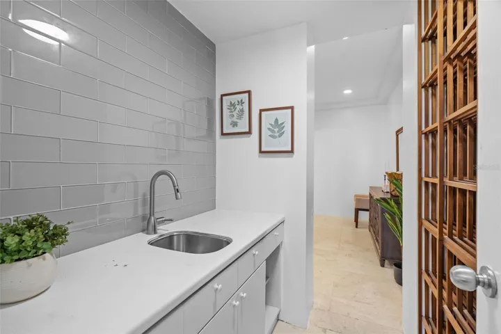 Sink and Wine Storage Off of Dining Room