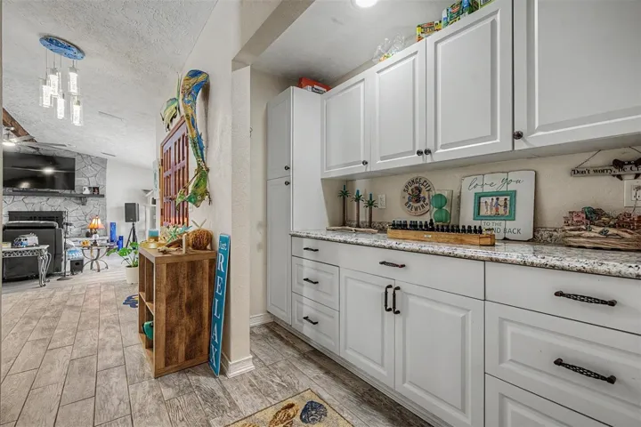 extra cabinetry  by kitchen