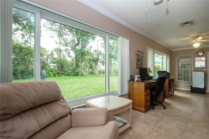 Serene garden views to enjoy from this multi purpose sun room