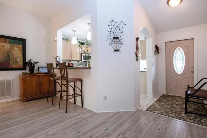 Entrance into home with kitchen to the right.