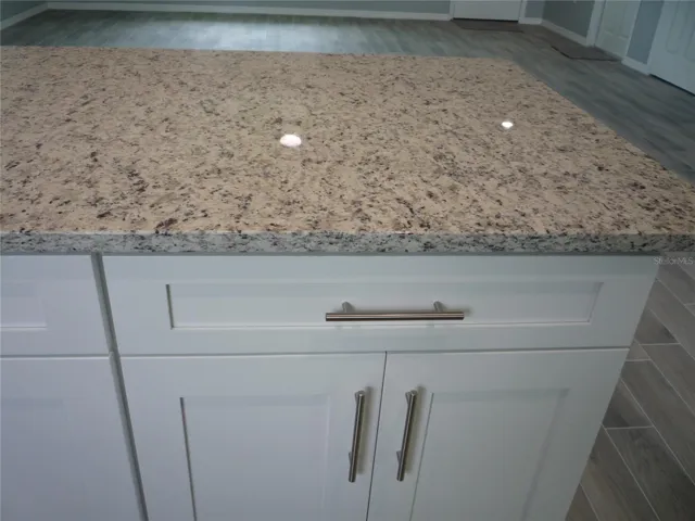 White Shaker Style soft close cabinets.