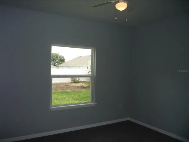 Master Bedroom with lush Gray Carpet.