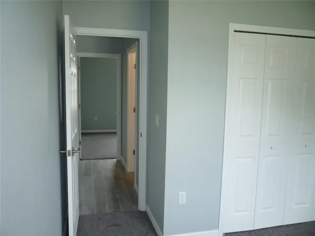 View from Bedroom 3 to hallway where Bathroom & Bedroom 2