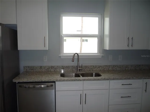 Kitchen window so you have a view while cleaning up.