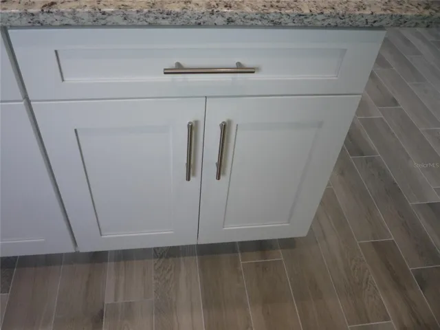 White Shaker Style soft close cabinets.