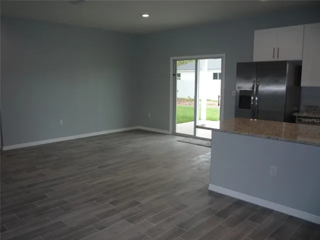 View looking to Dining Room & Kitchen