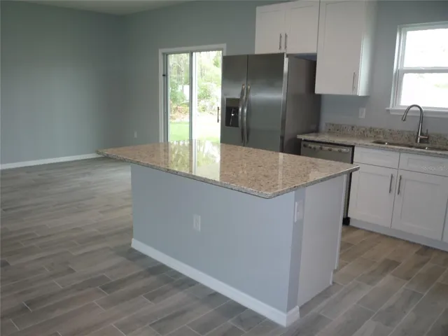 View looking to Dining Room & Kitchen