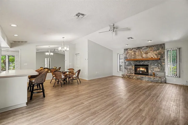 Living and entertaining area. Wood burning fireplace.