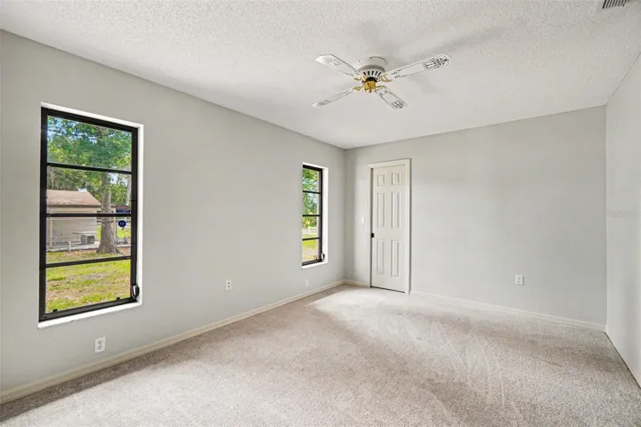 Bedroom 2 with walk-in closet and pocket door
