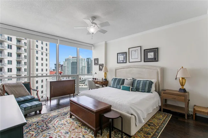 The spacious primary suite serves as a peaceful retreat