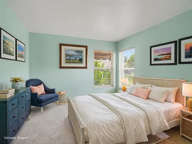 Virtually staged guest bedroom.