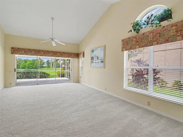 Living Room with slider to Extended Lanai