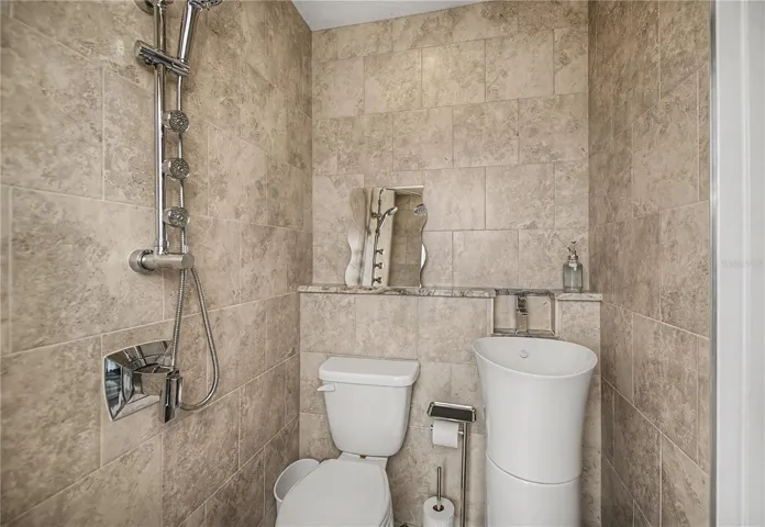 pool /patio ensuite bath  serves 2nd bedroom