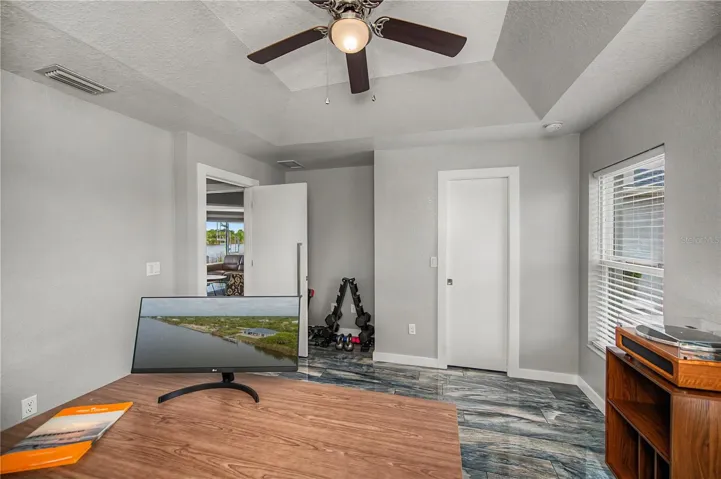Third Bedroom or Home Office with Tray Ceilings and Abundant Natural Light.
