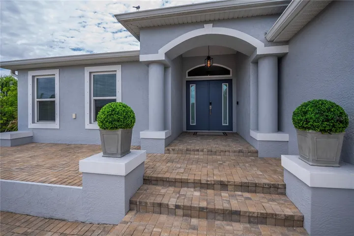 soaring covered column lined entry