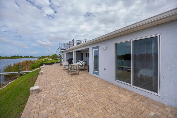 Guest Direct Access to Patio and Waterfront Breezes.