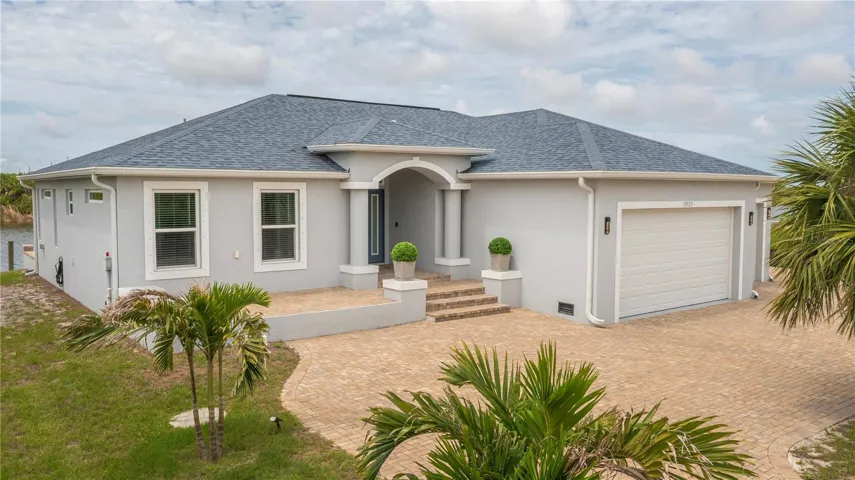 3 car garage custom home with grand entry