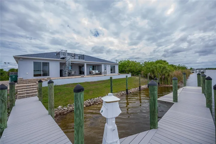 Private Dock and Expansive Waterfront Setting Designed for the Ultimate Boating Lifestyle.