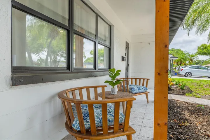 Notice the tile floor on the porch.