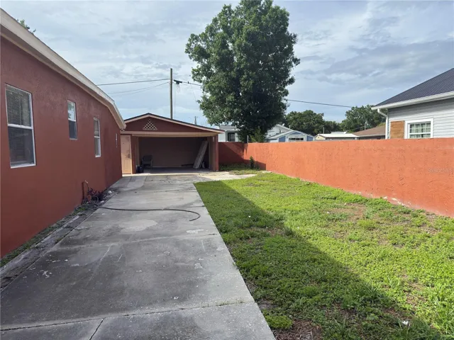 Side Back yard facing 2 gar Garage.