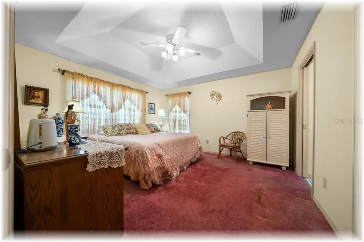 SPACIOUS PRIMARY BEDROOM...