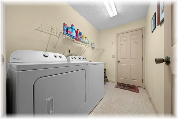 EVEN HAS INSIDE LAUNDRY RM!