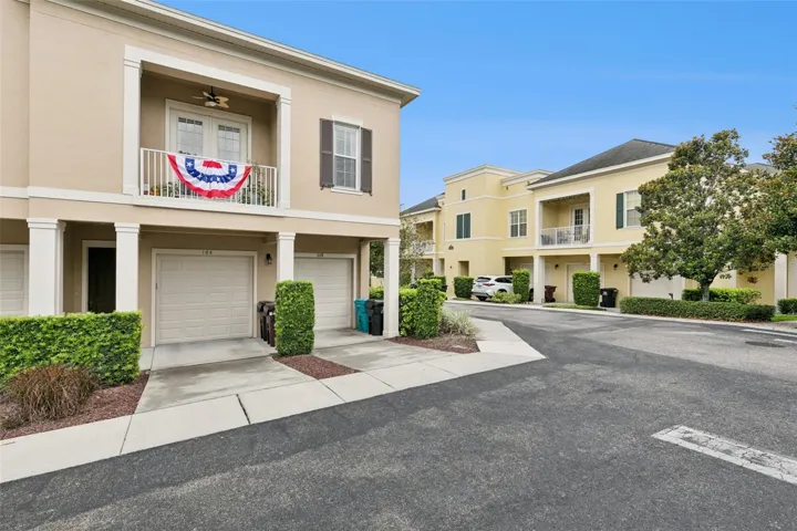 Rear entry 1-car garage with tandem parking space.