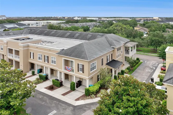 Alternate view of rear entry garage and condo building