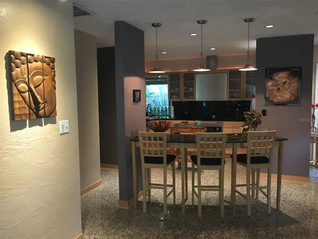 Island Bar separating Kitchen from Family
