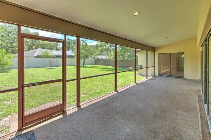 Covered Screened Patio with HUGE backyard with Starfruit & Avocado Tree
