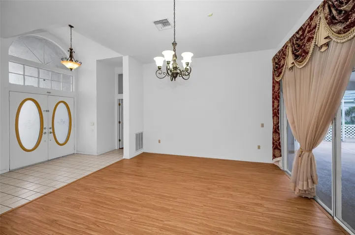 Formal Living Room & Doorway To The Primary Bedroom