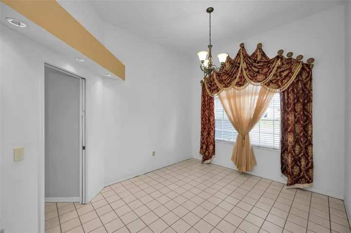 Formal Dining Room With Access To The Kitchen