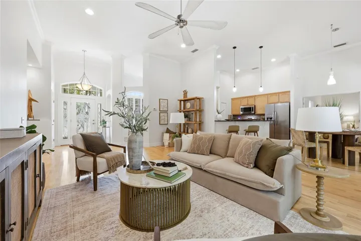 The owners added endless upgrades and special design choices including extra tall ceilings, wood floors throughout the main living areas.