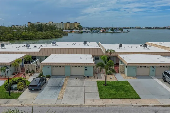 New roof installed in 2019, including a warranty and metal mansards. The property also features a two-car driveway.